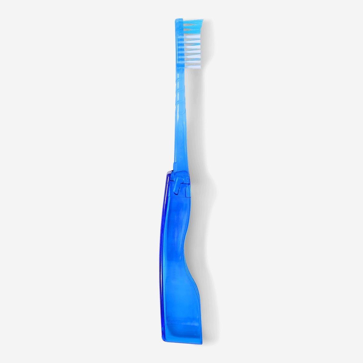 Medium hard travel toothbrush