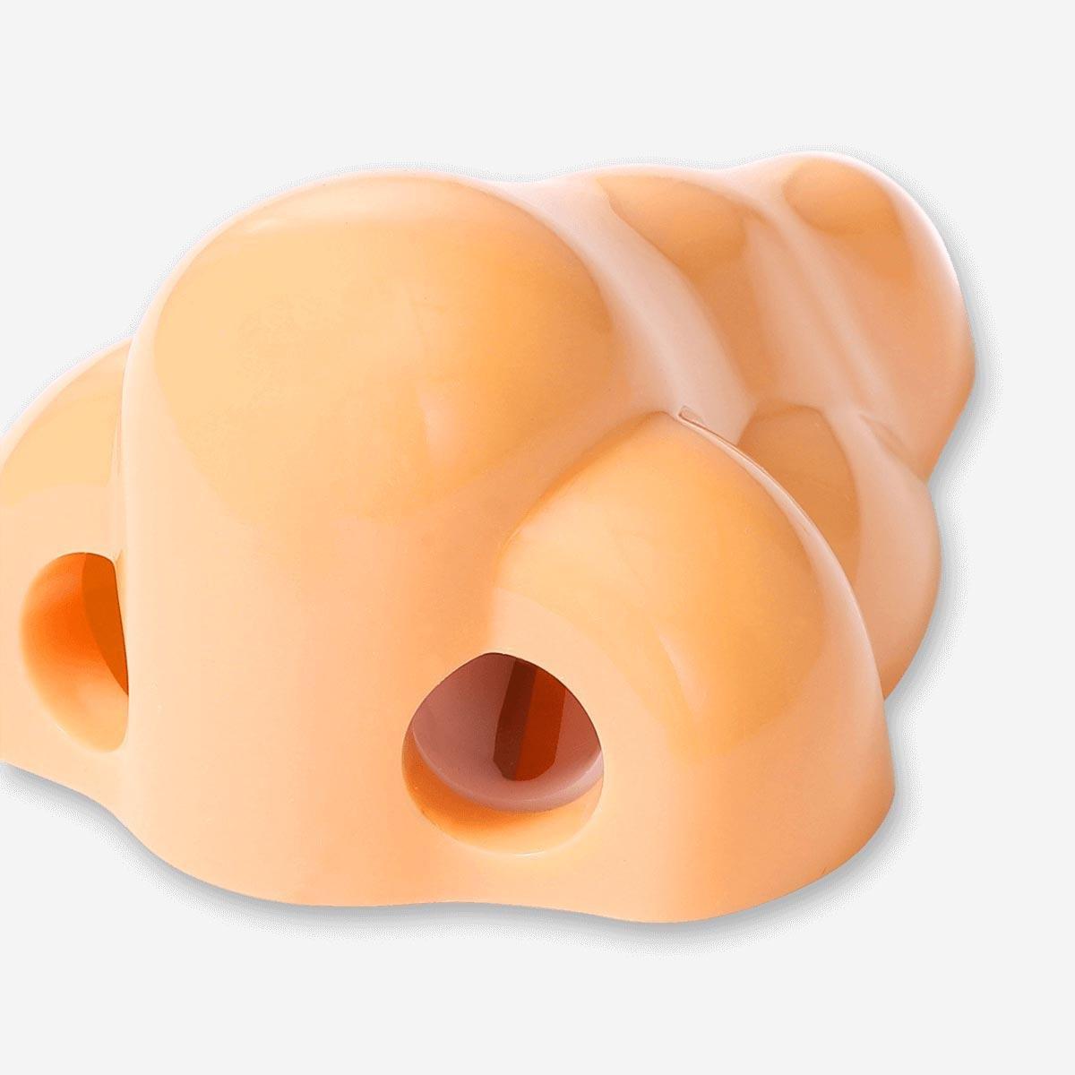 Beige Nose shaped pencil sharpener