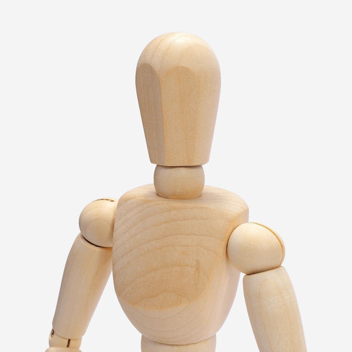 Brown wooden drawing mannequin