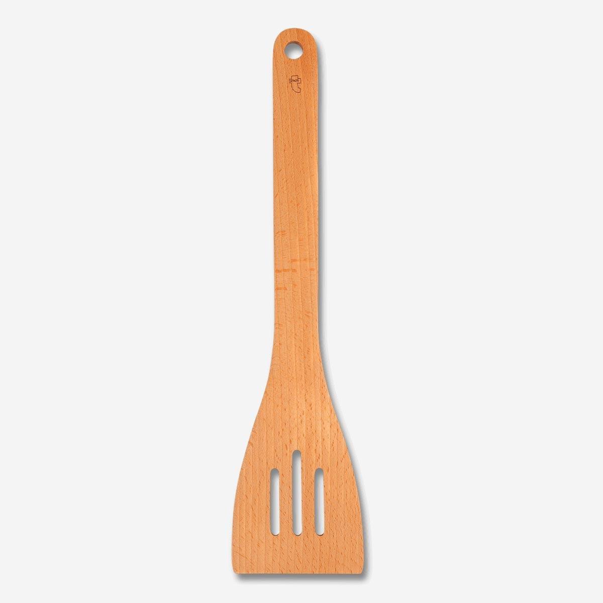 Brown wooden slotted spatula