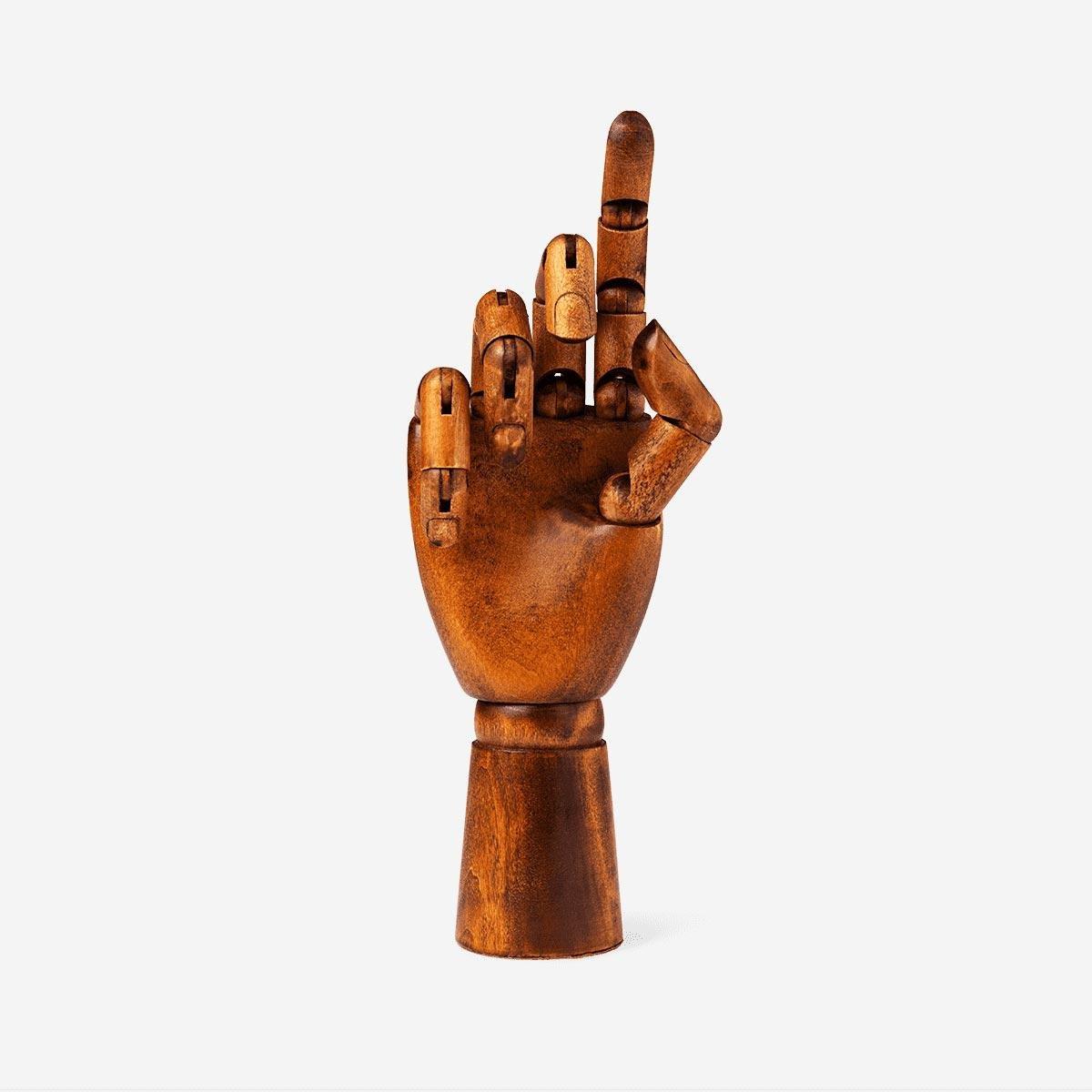 Brown wooden croquis hand