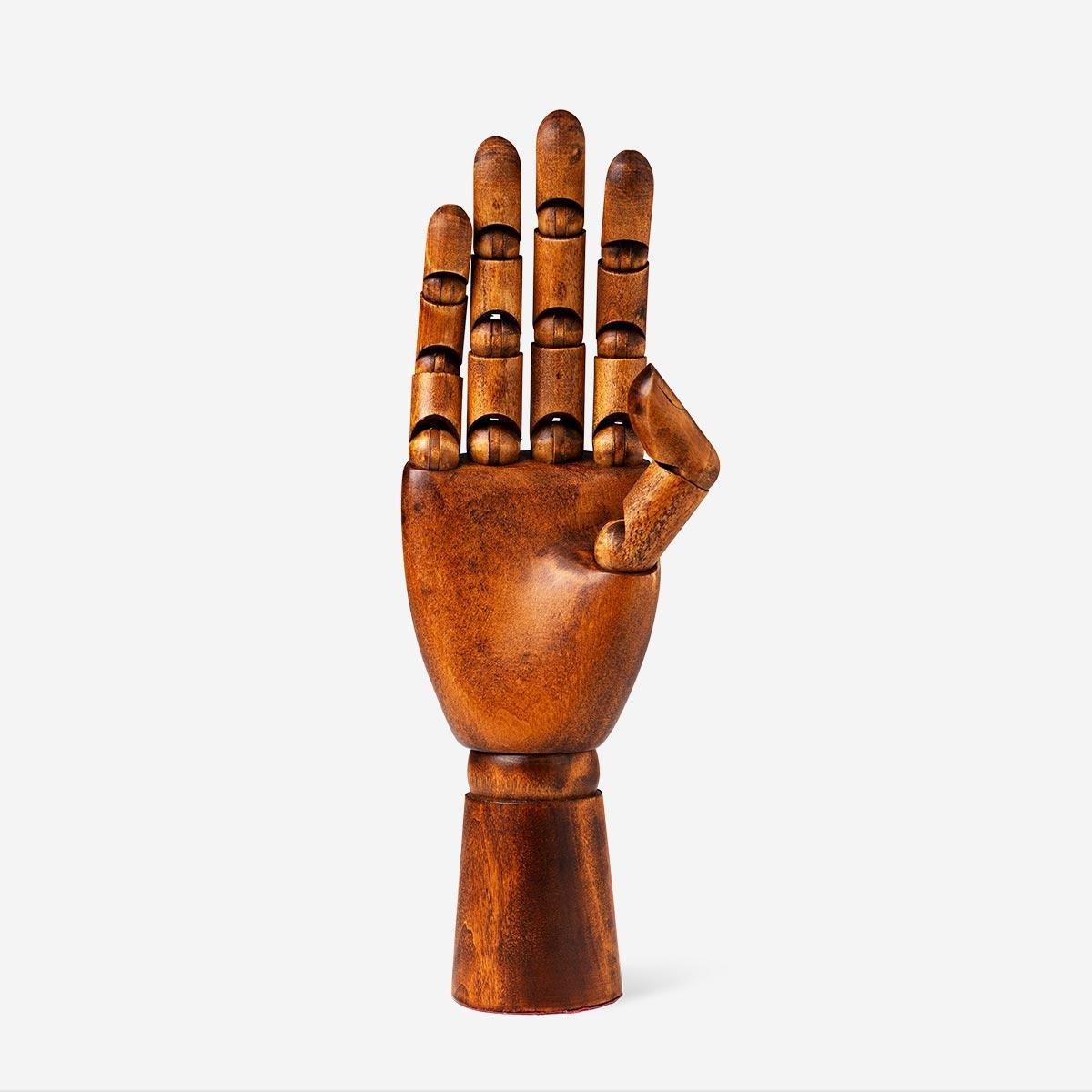 Brown wooden croquis hand