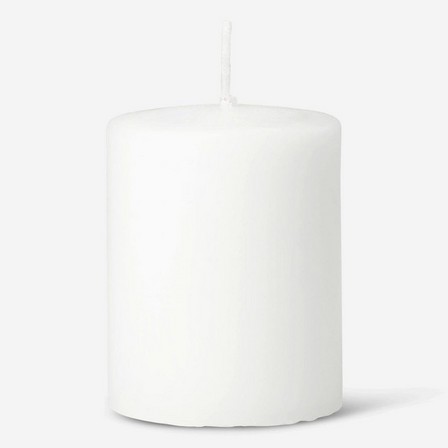 White pillar candle. 9 cm
