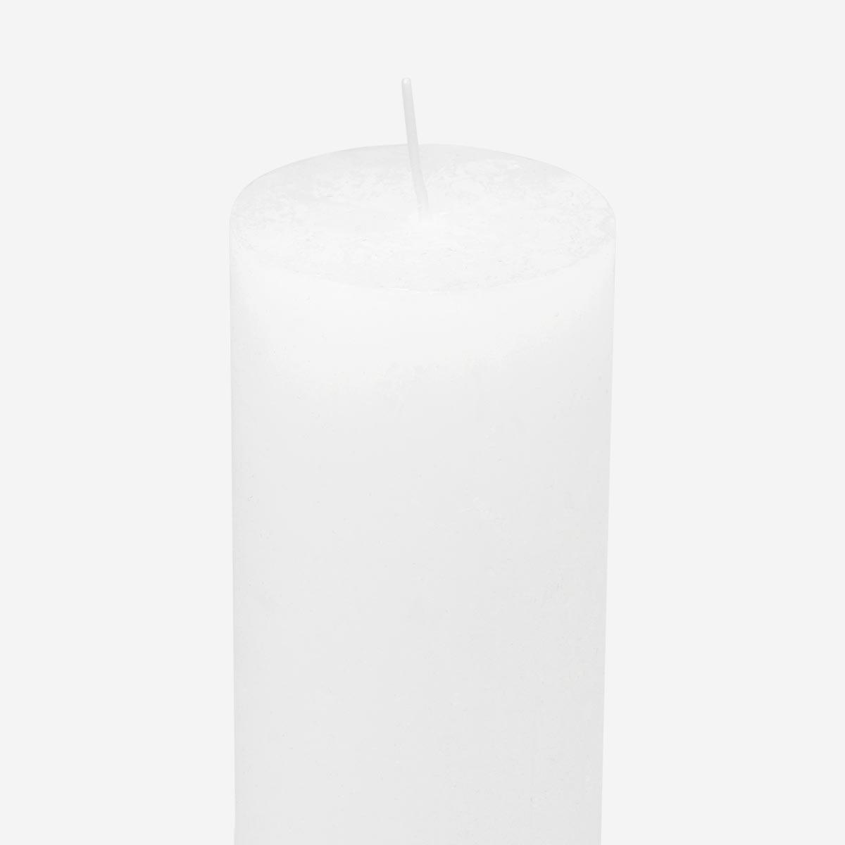 White pillar candle. 9 cm