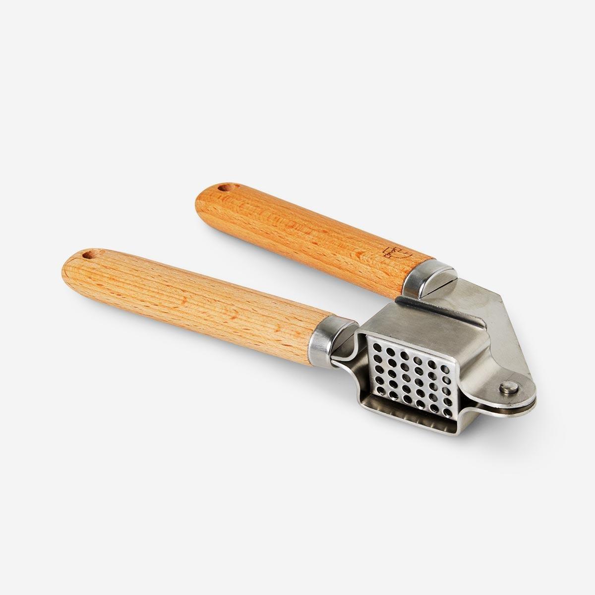 Silver stainless steel garlic press
