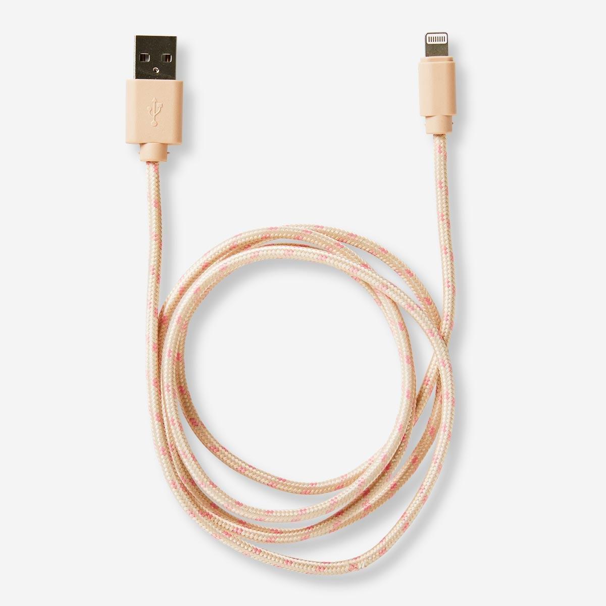 Beige iPhone charging cable.