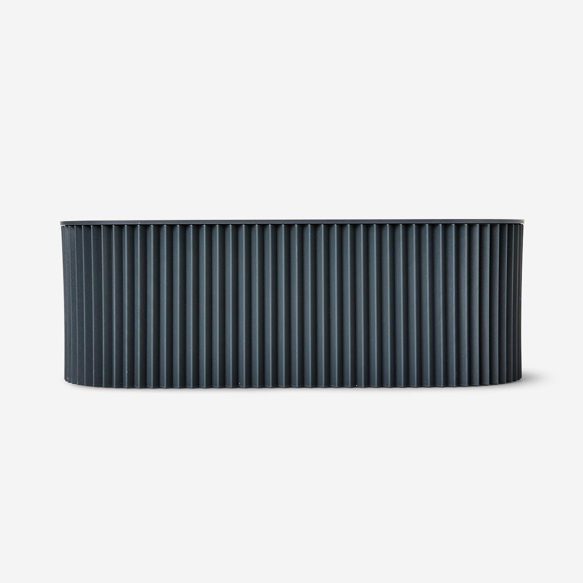 Black ribbed plastic box cable hider