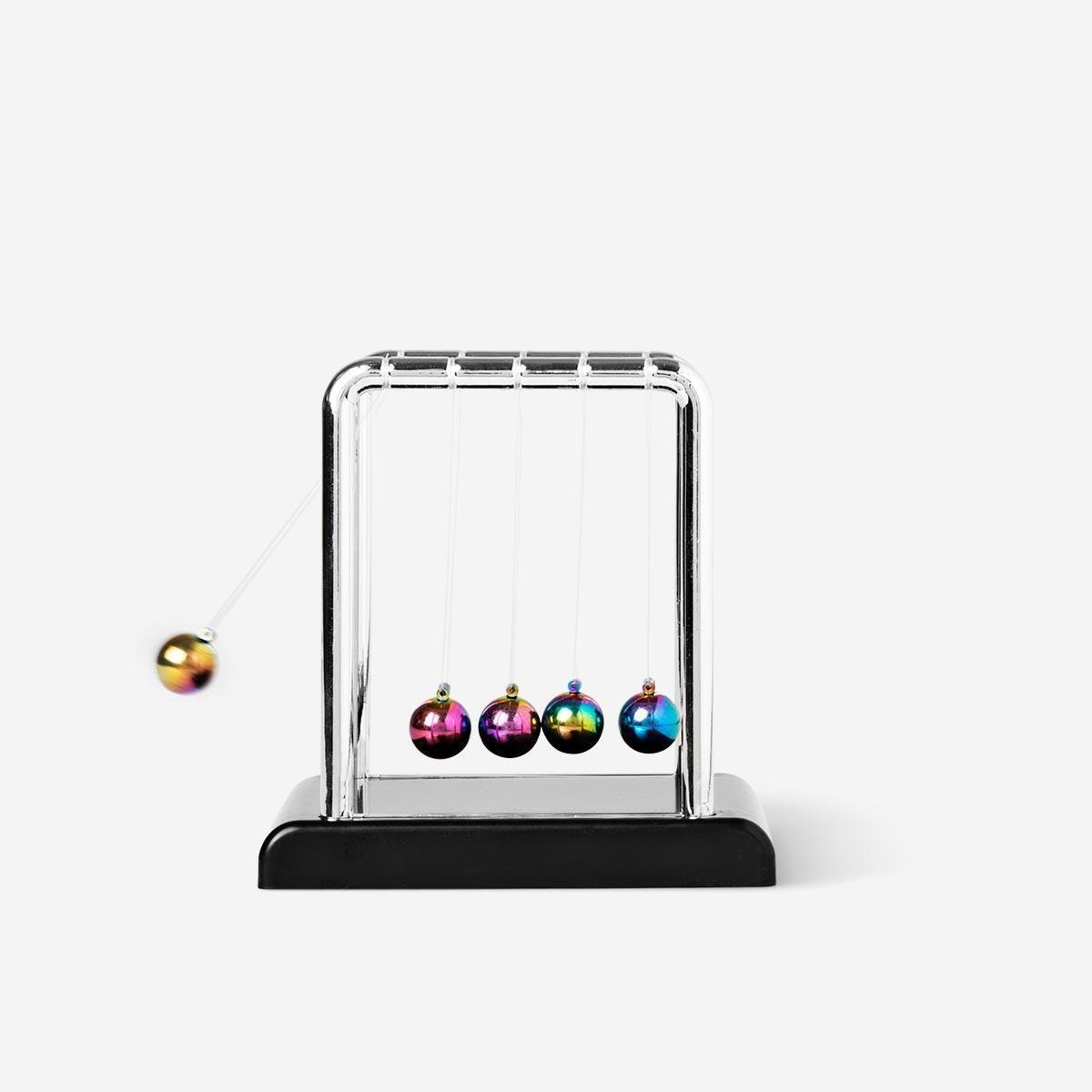 Coloured swinging newtons cradle