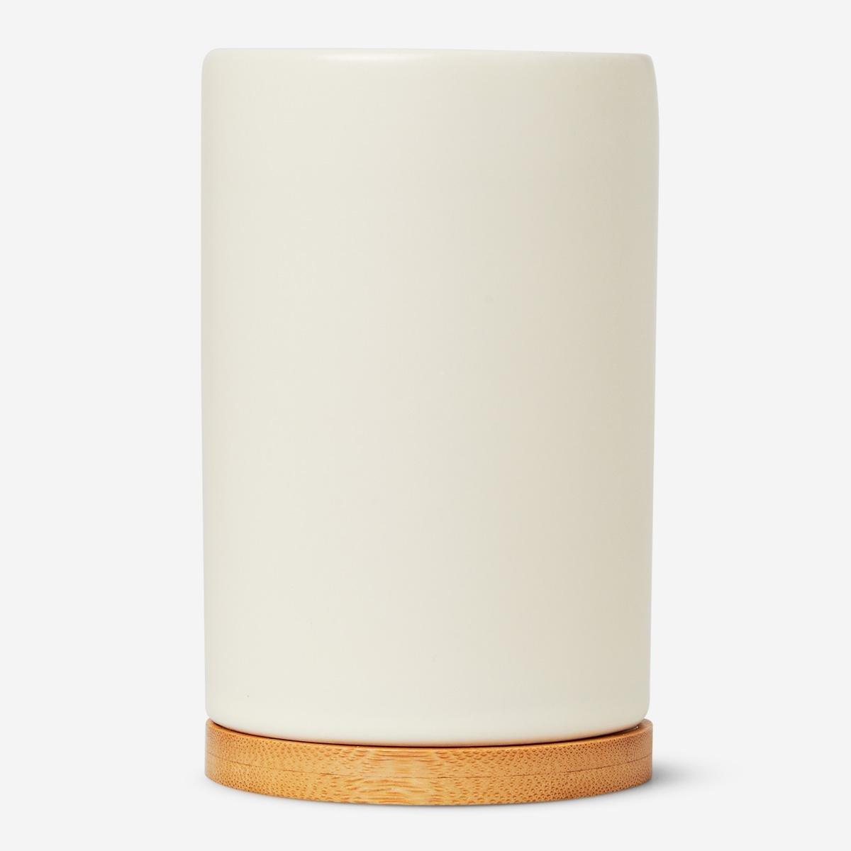 White ceramic toothbrush holder