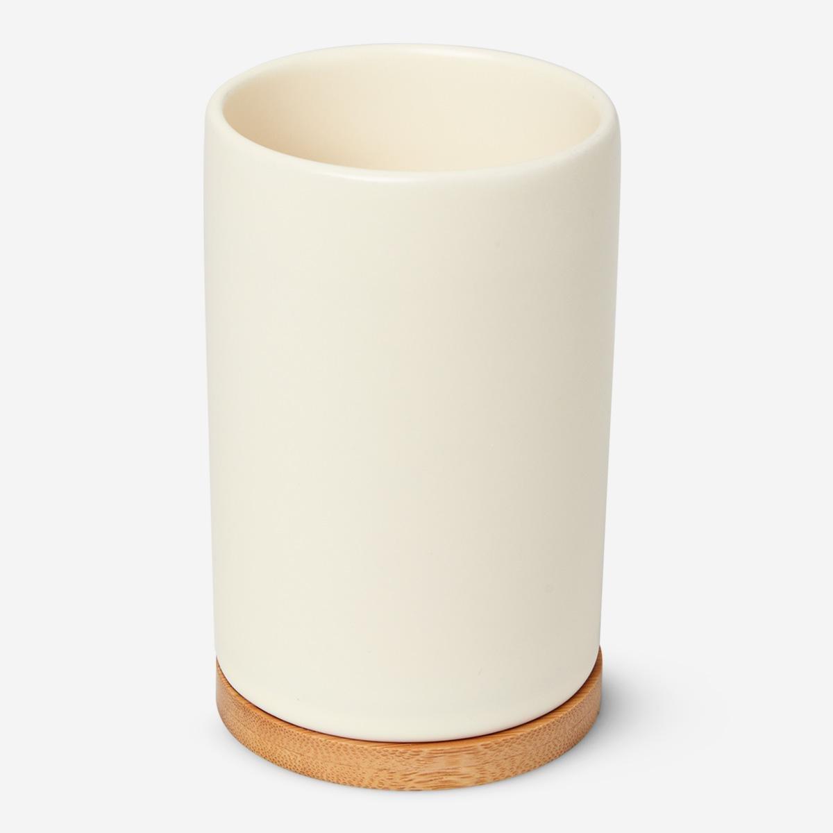 White ceramic toothbrush holder