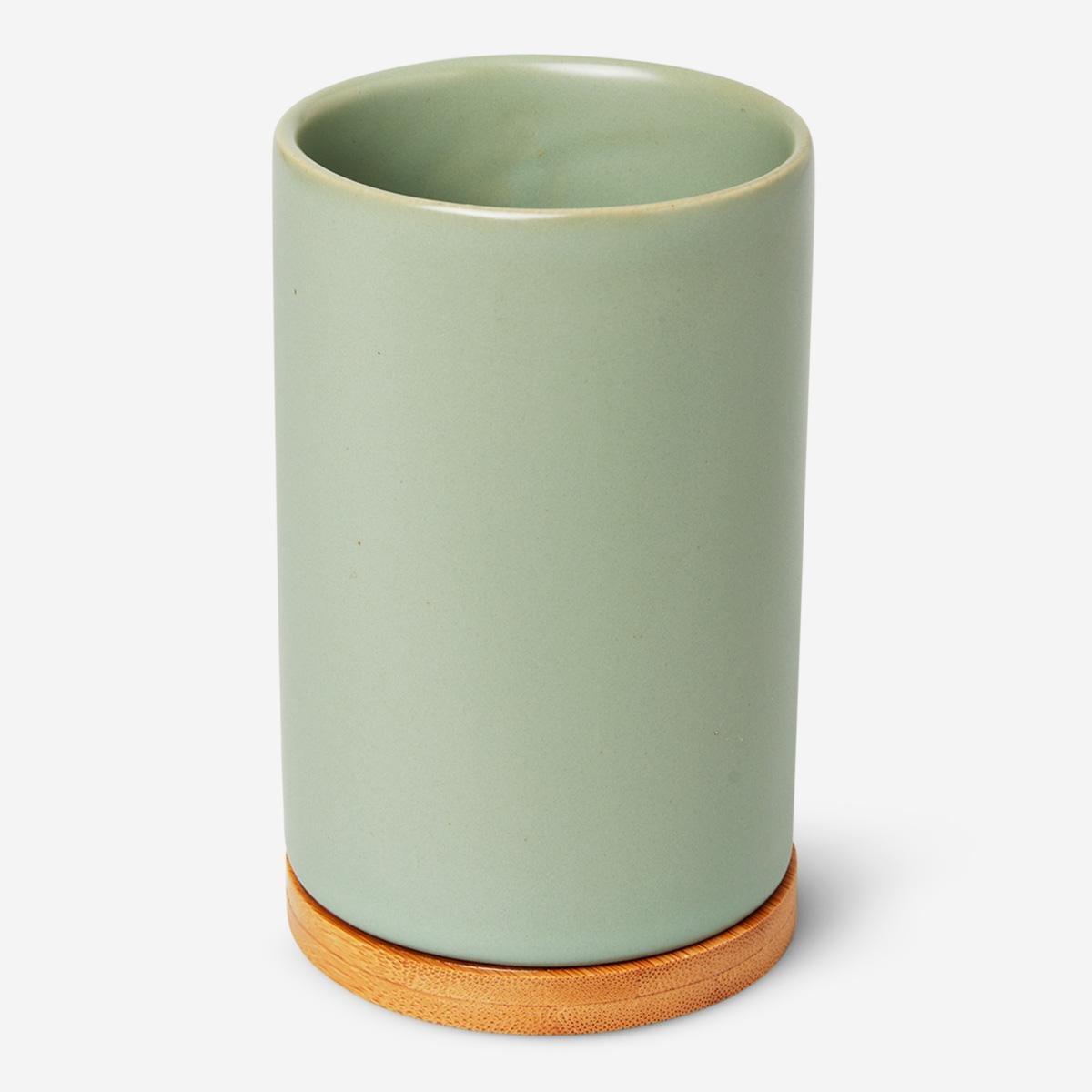 Green ceramic toothbrush holder
