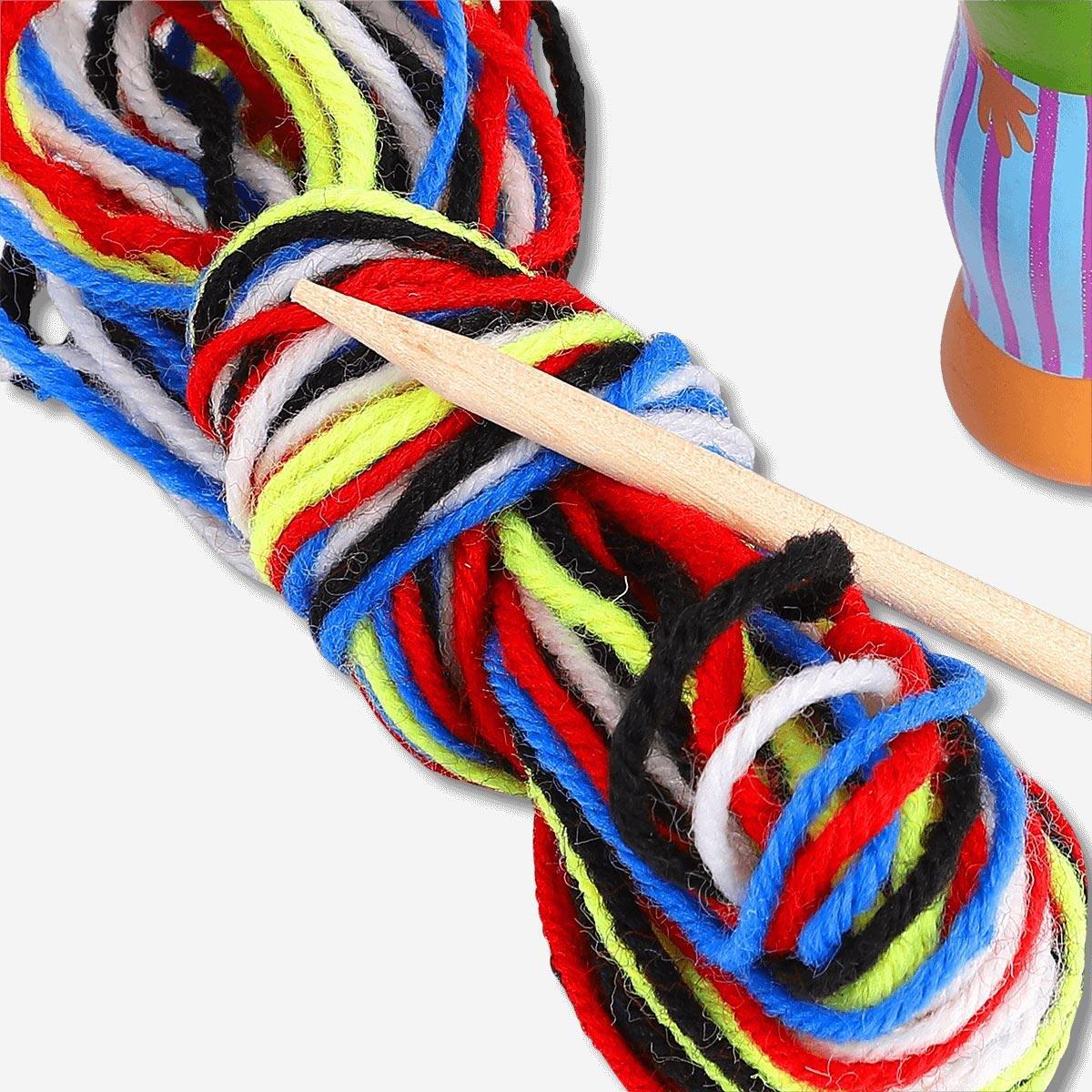 Red wooden knitting doll
