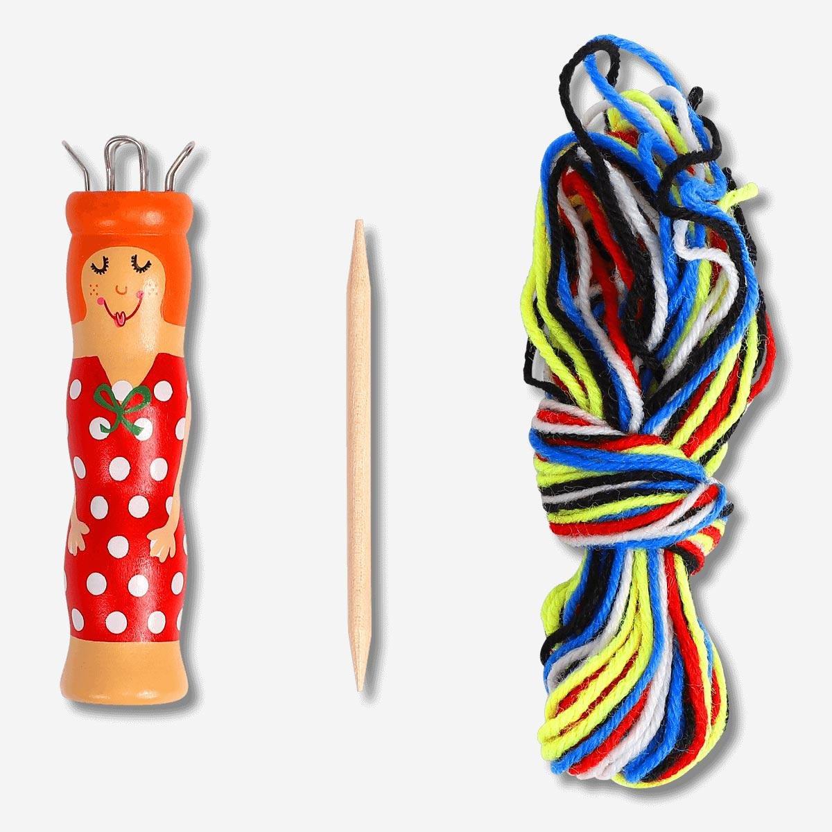 Red wooden knitting doll