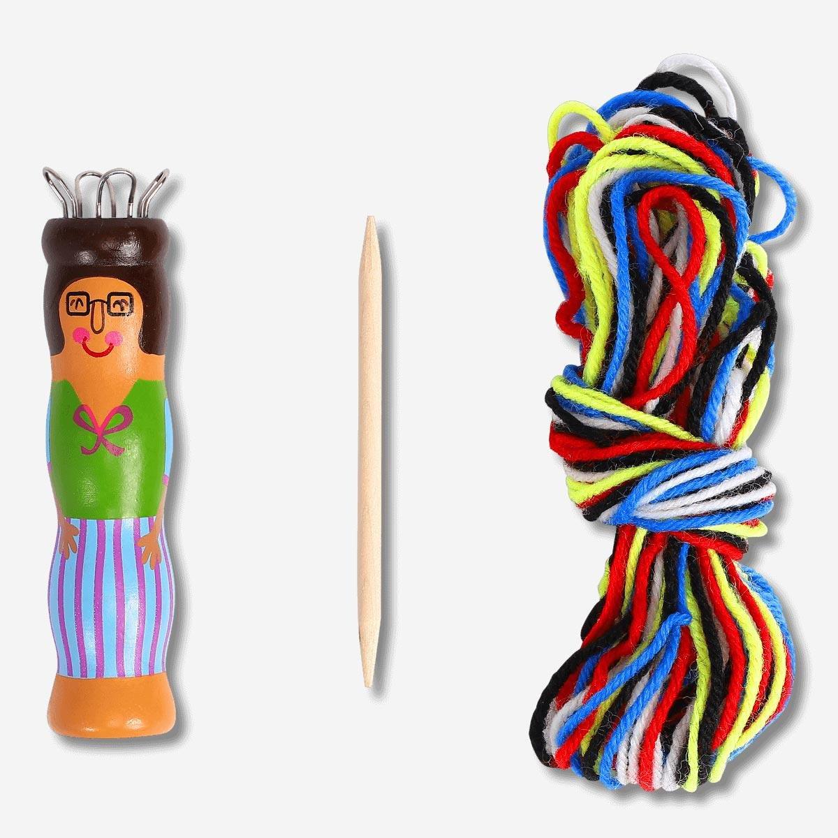 Green wooden knitting doll