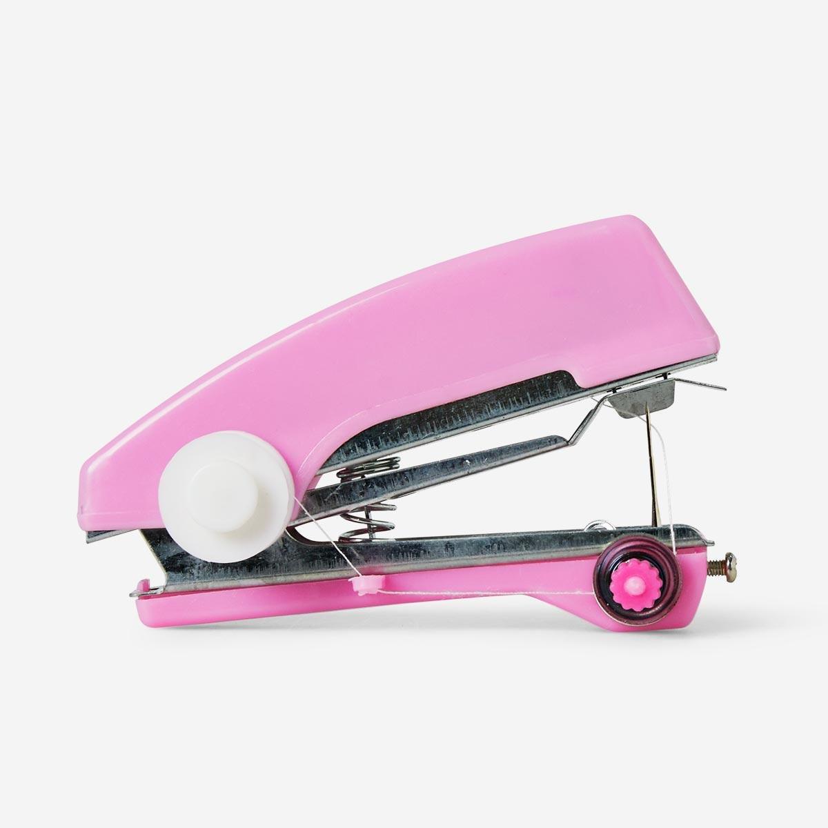Pink handheld sewing machine