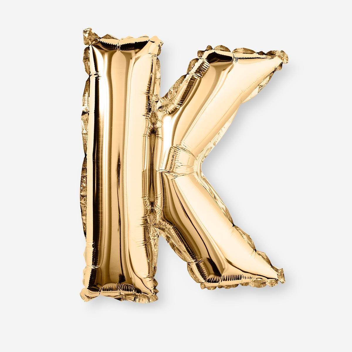 Gold K shaped aluminium balloon
