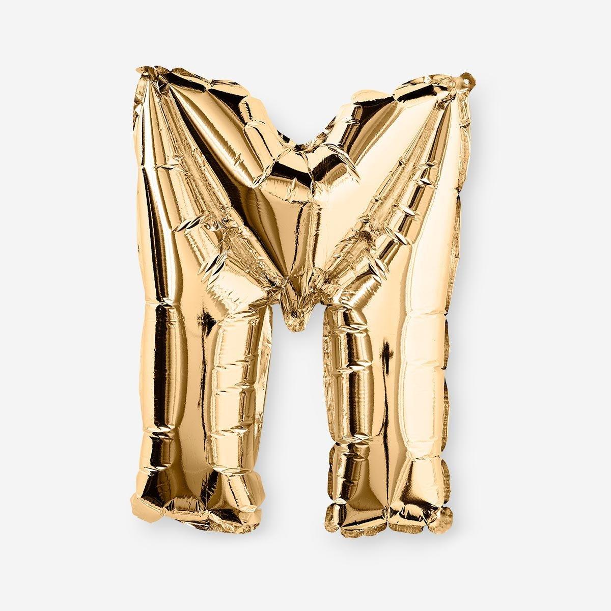 Gold M shaped aluminium balloon