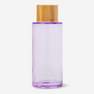 Purple glass travel bottle. 50 ml