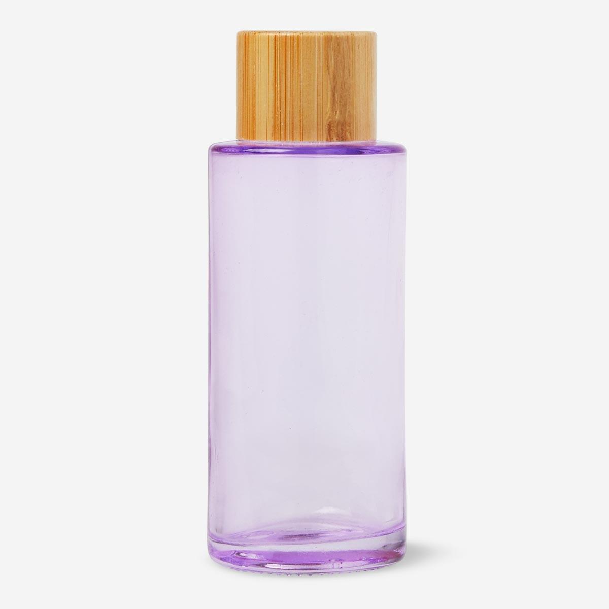 Purple glass travel bottle. 50 ml