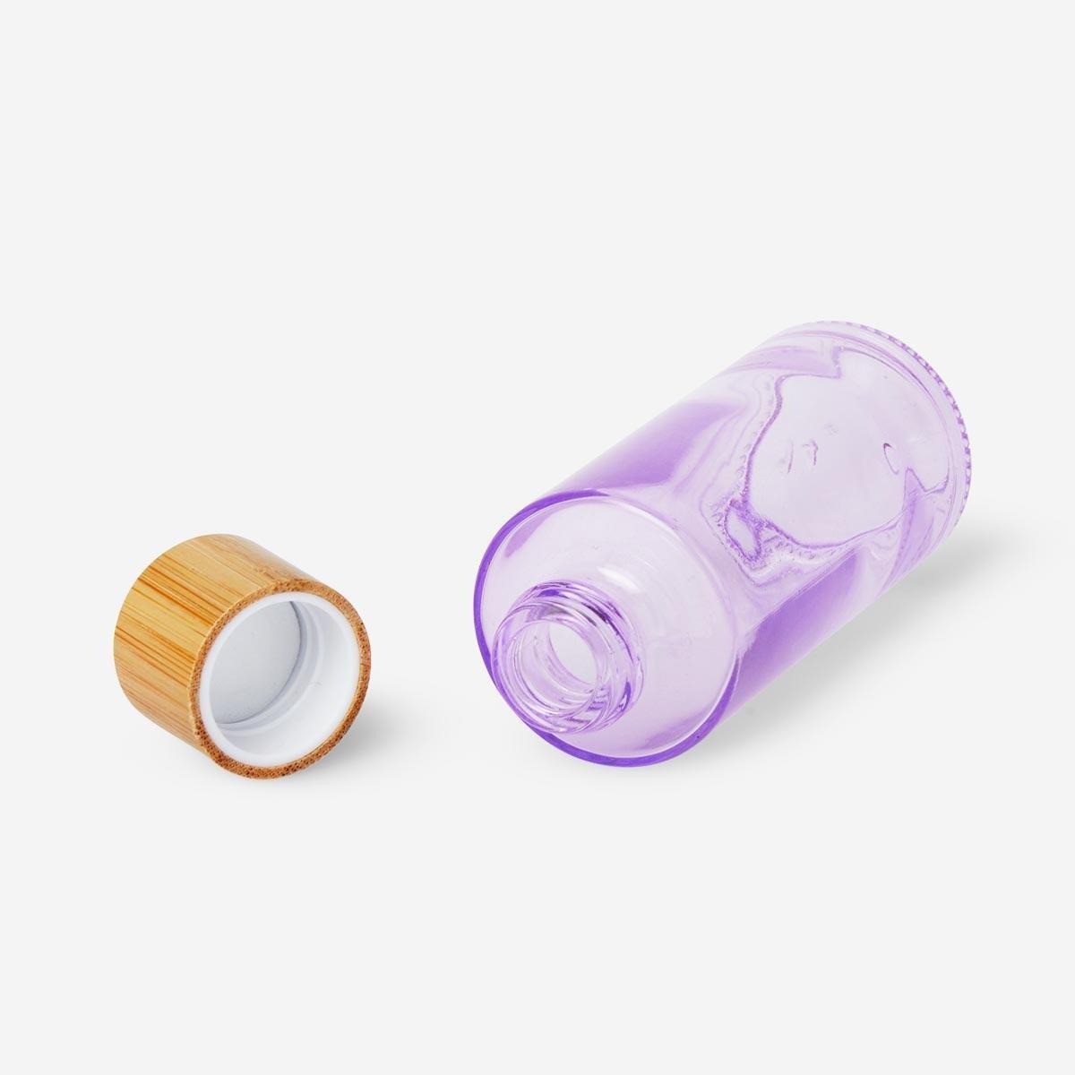 Purple glass travel bottle. 50 ml