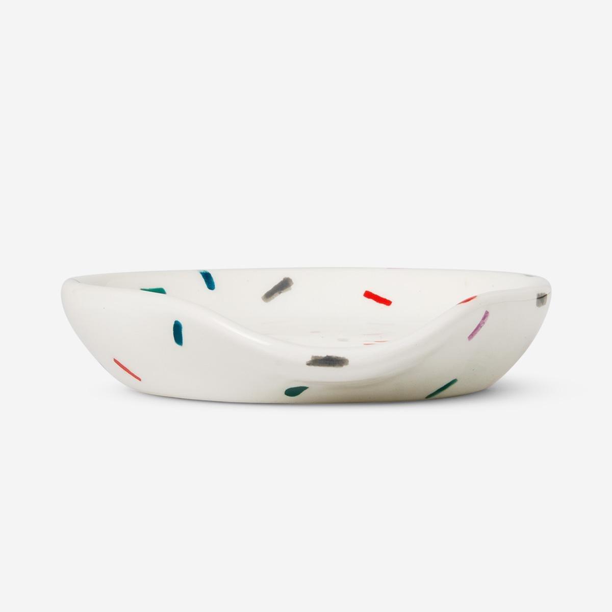 White ceramic spoon holder