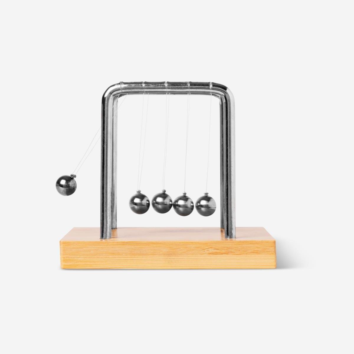 Wooden base newtons cradle
