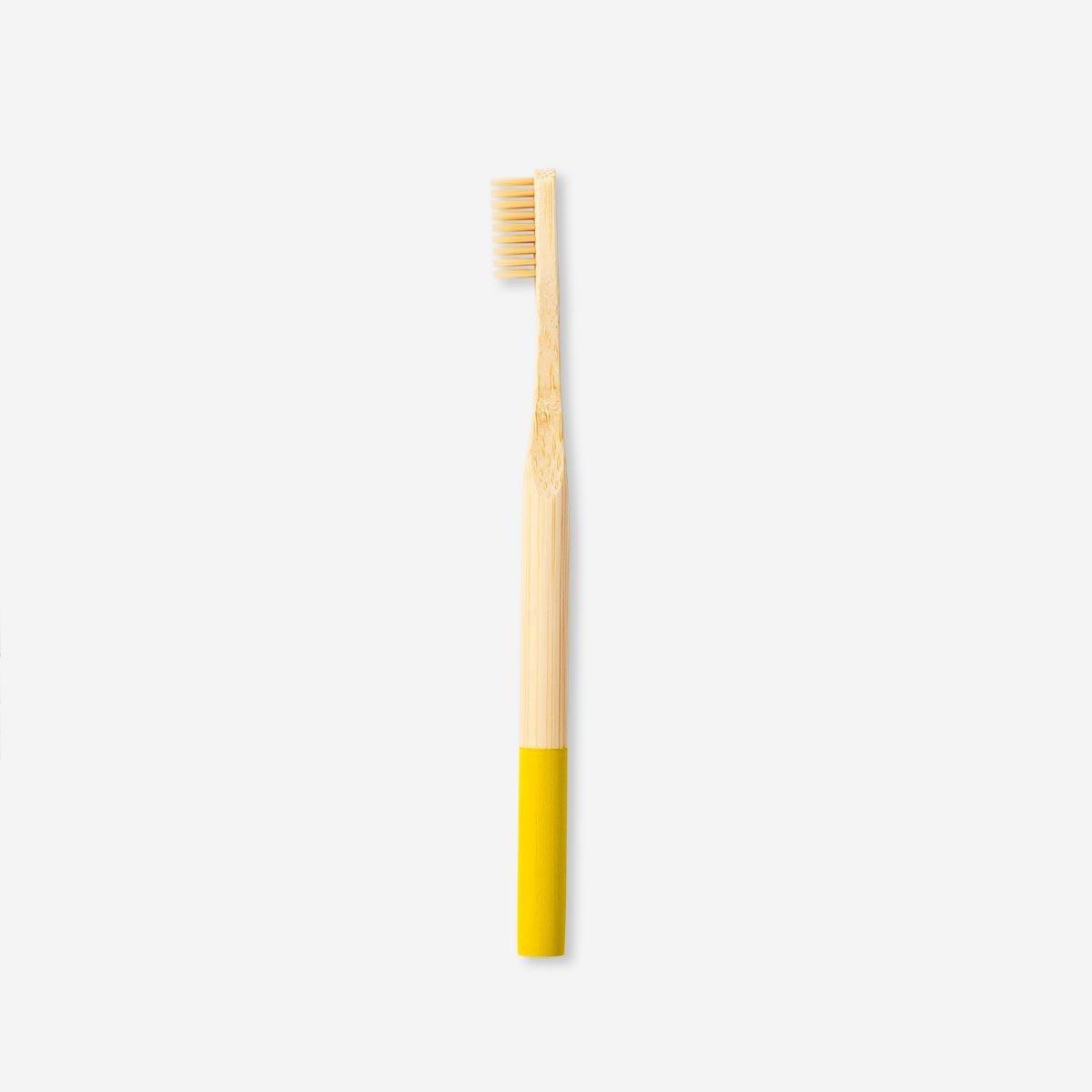 Yellow Wooden toothbrush
