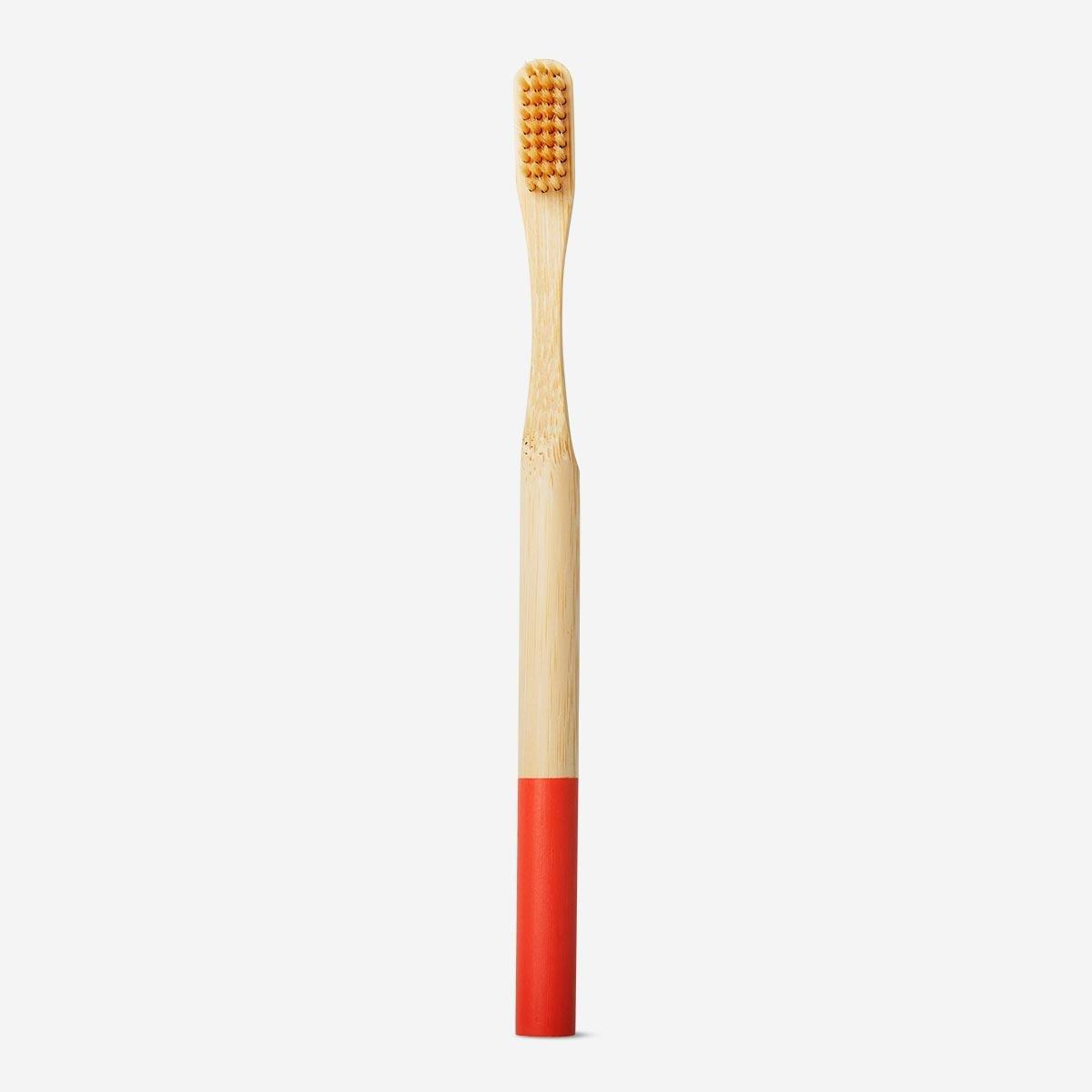 Wooden red toothbrush