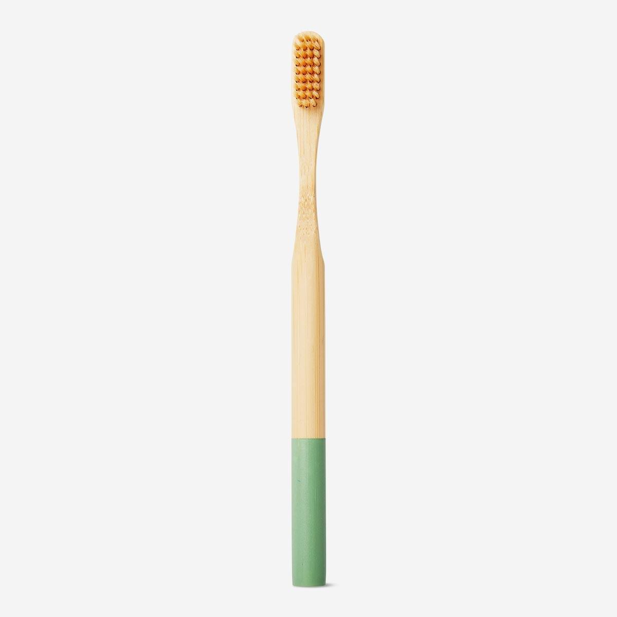 Wooden turquoise toothbrush