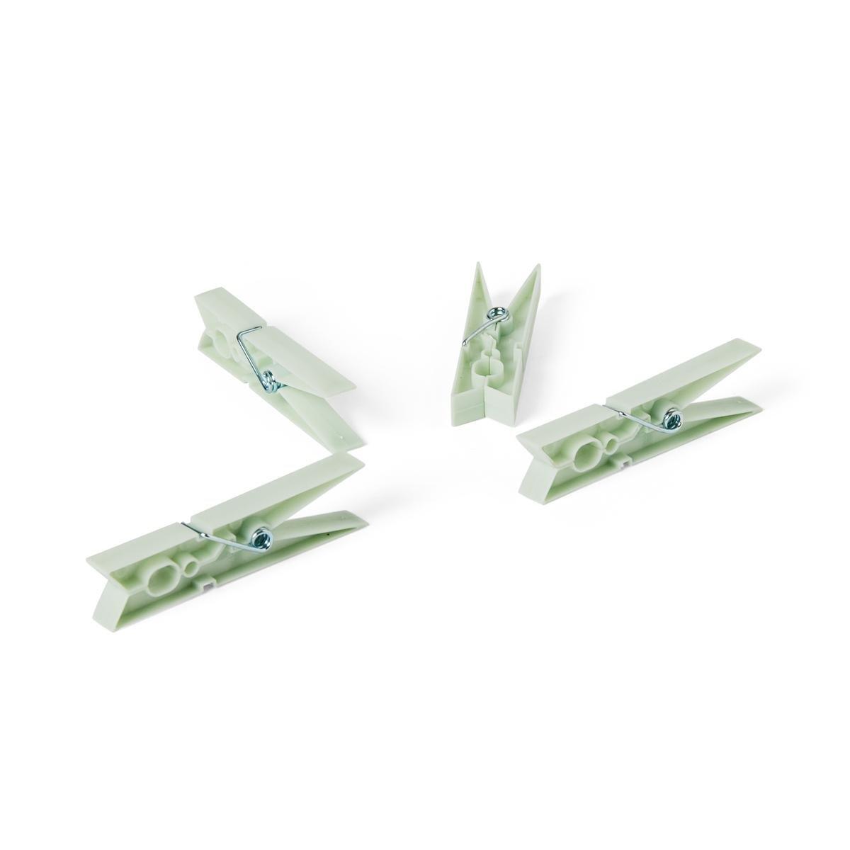 Green clothes pegs