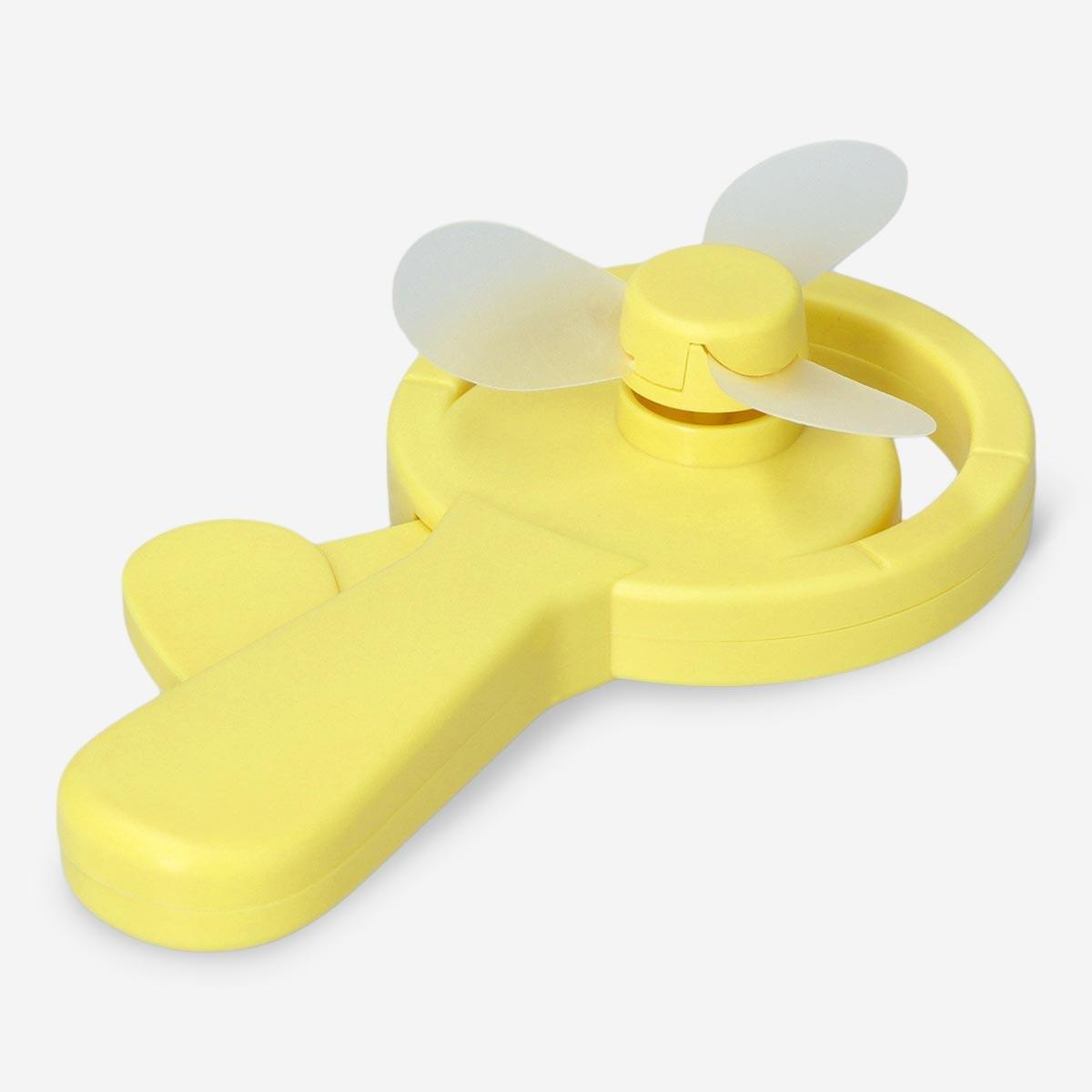 Yellow hand-held fan