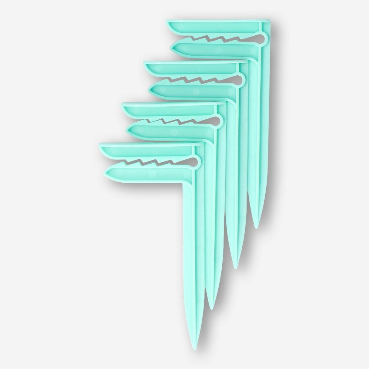 Green beach towel pegs. 4 pcs