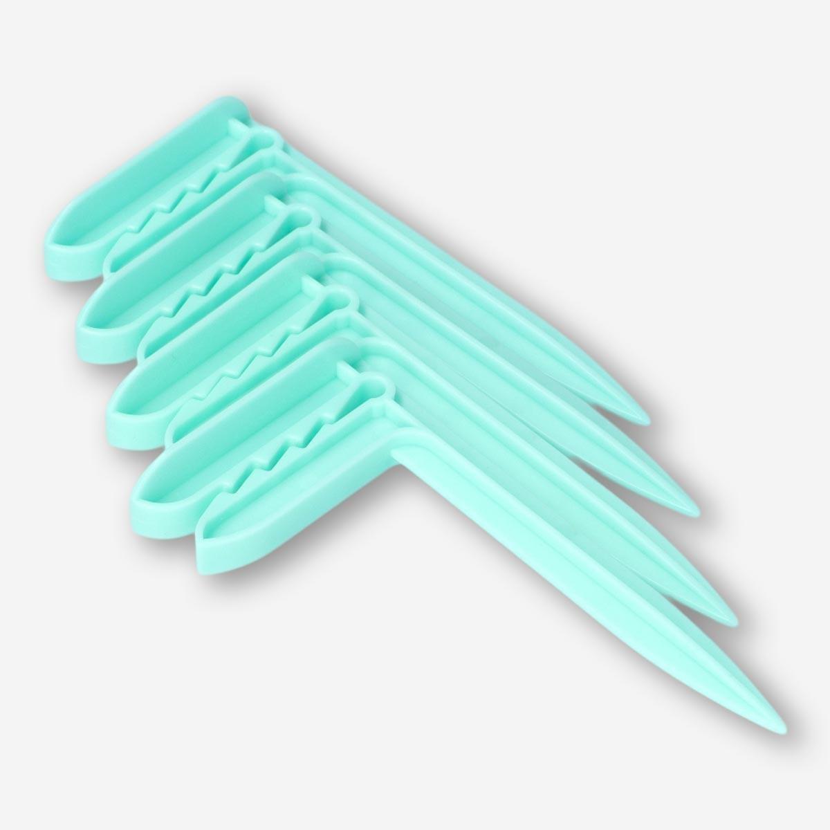 Green beach towel pegs. 4 pcs