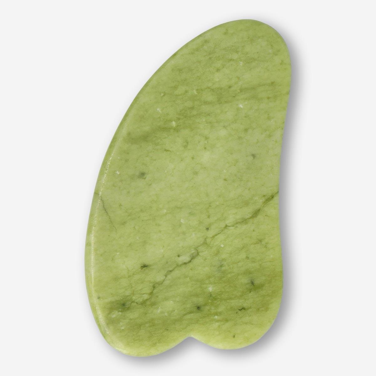 Green gua sha tool. natural stone
