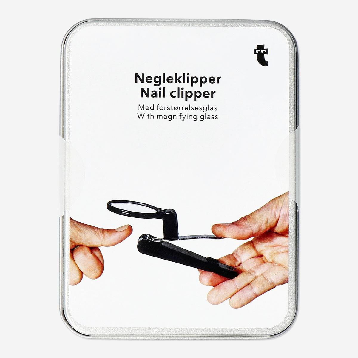 Silver nail clipper. with magnifying glass