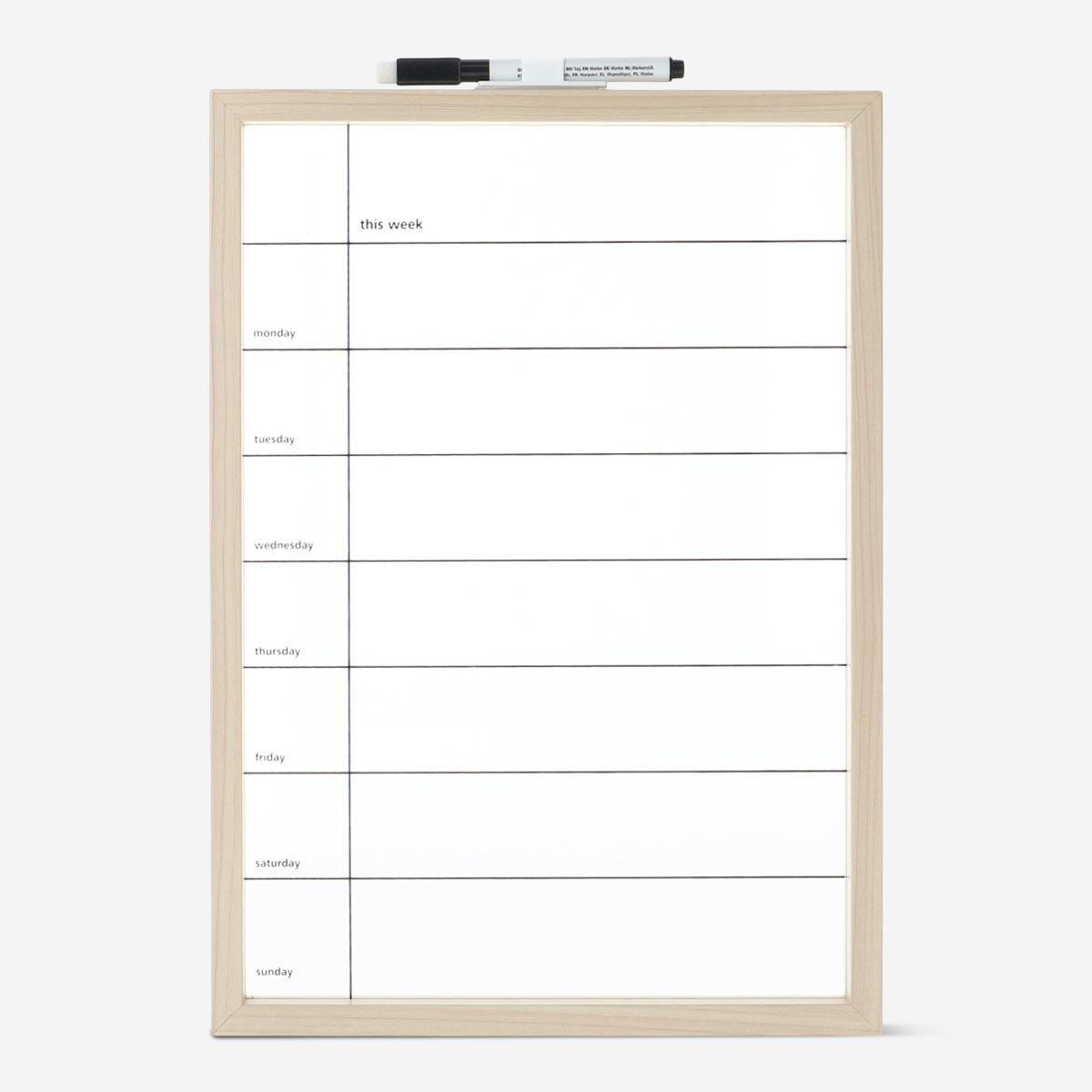 White planner board. with marker