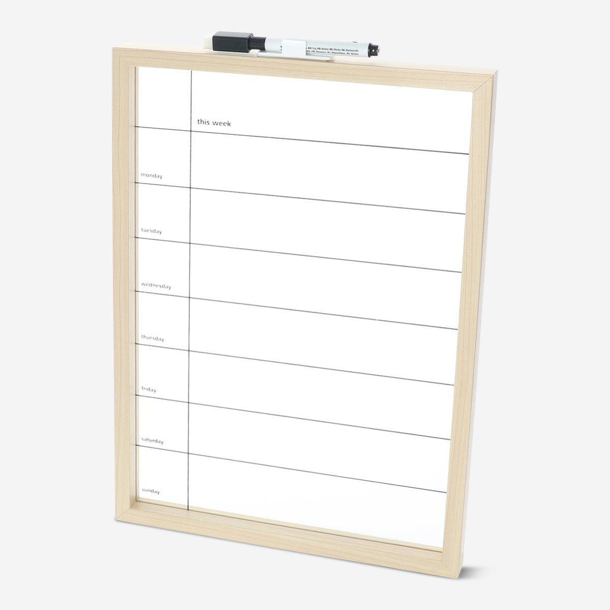 White planner board. with marker