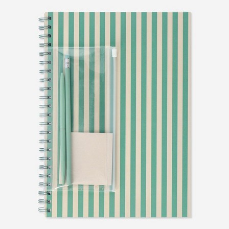 Green notebook with writing utensils. a4