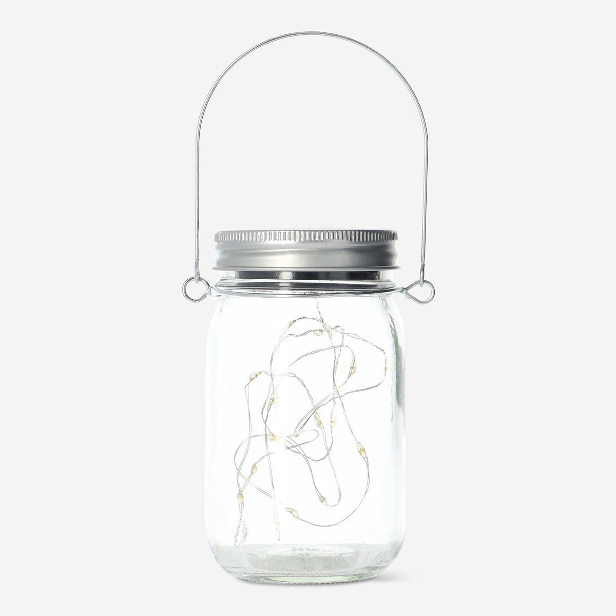 Transparent solar-powered lantern