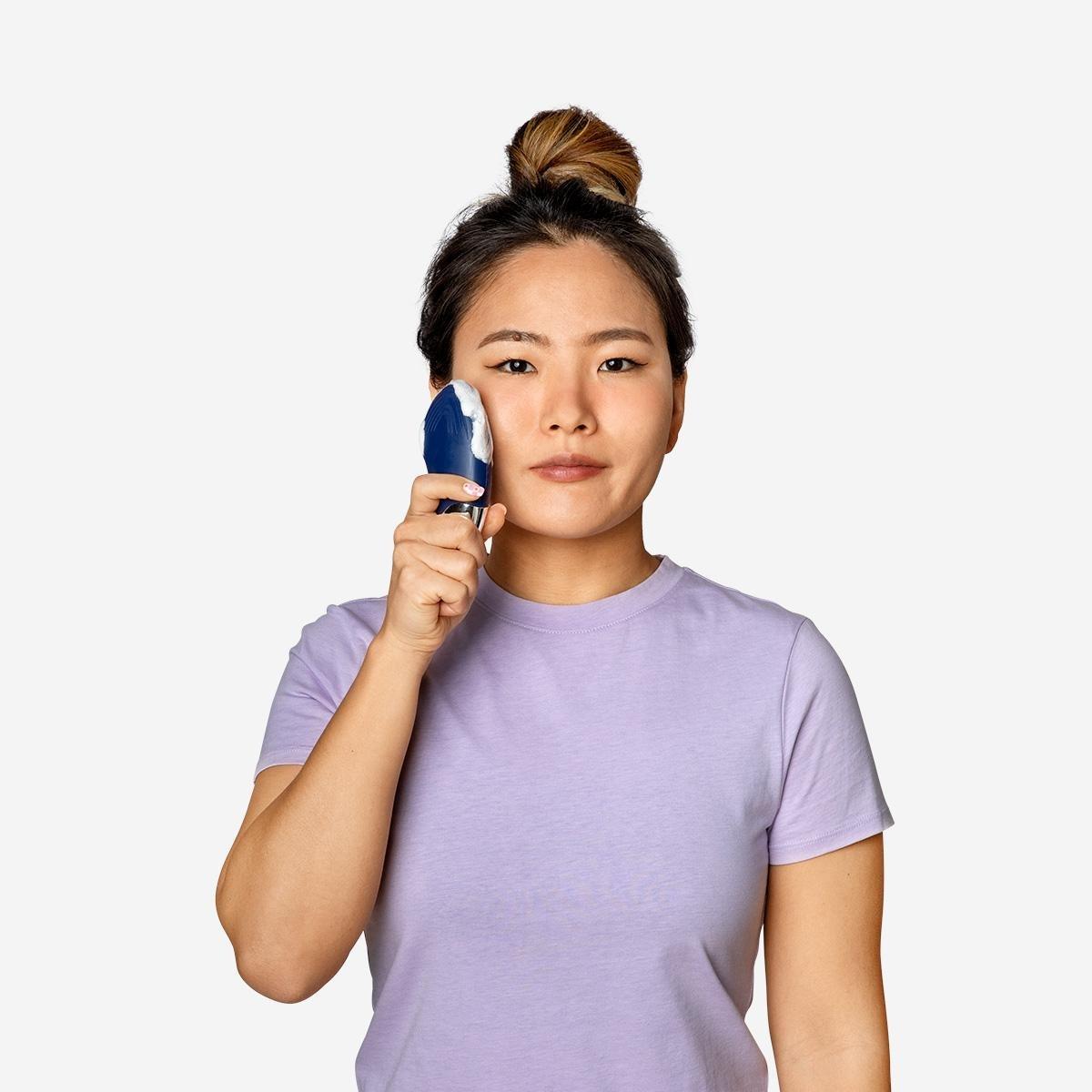 Blue facial cleansing brush