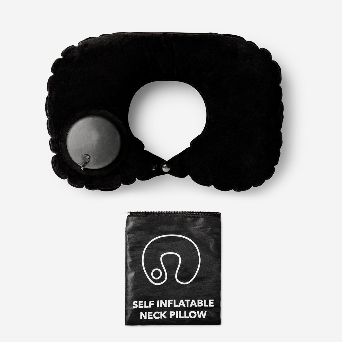 Black self-inflating travel pillow