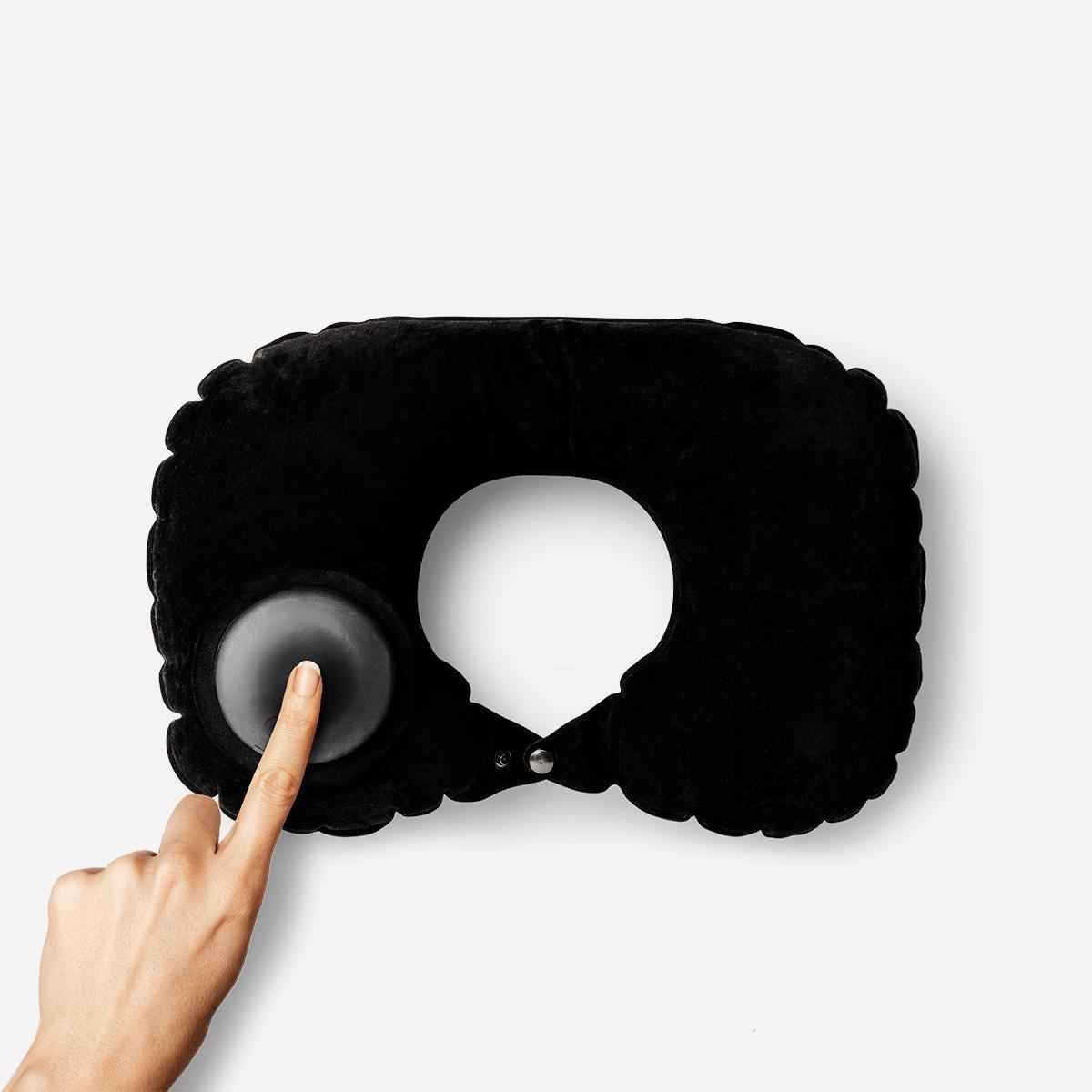 Black self-inflating travel pillow