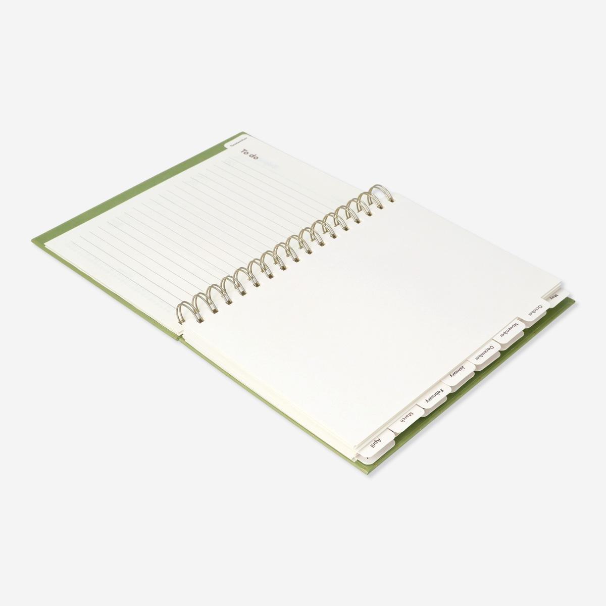 Green study planner. with weekly diary