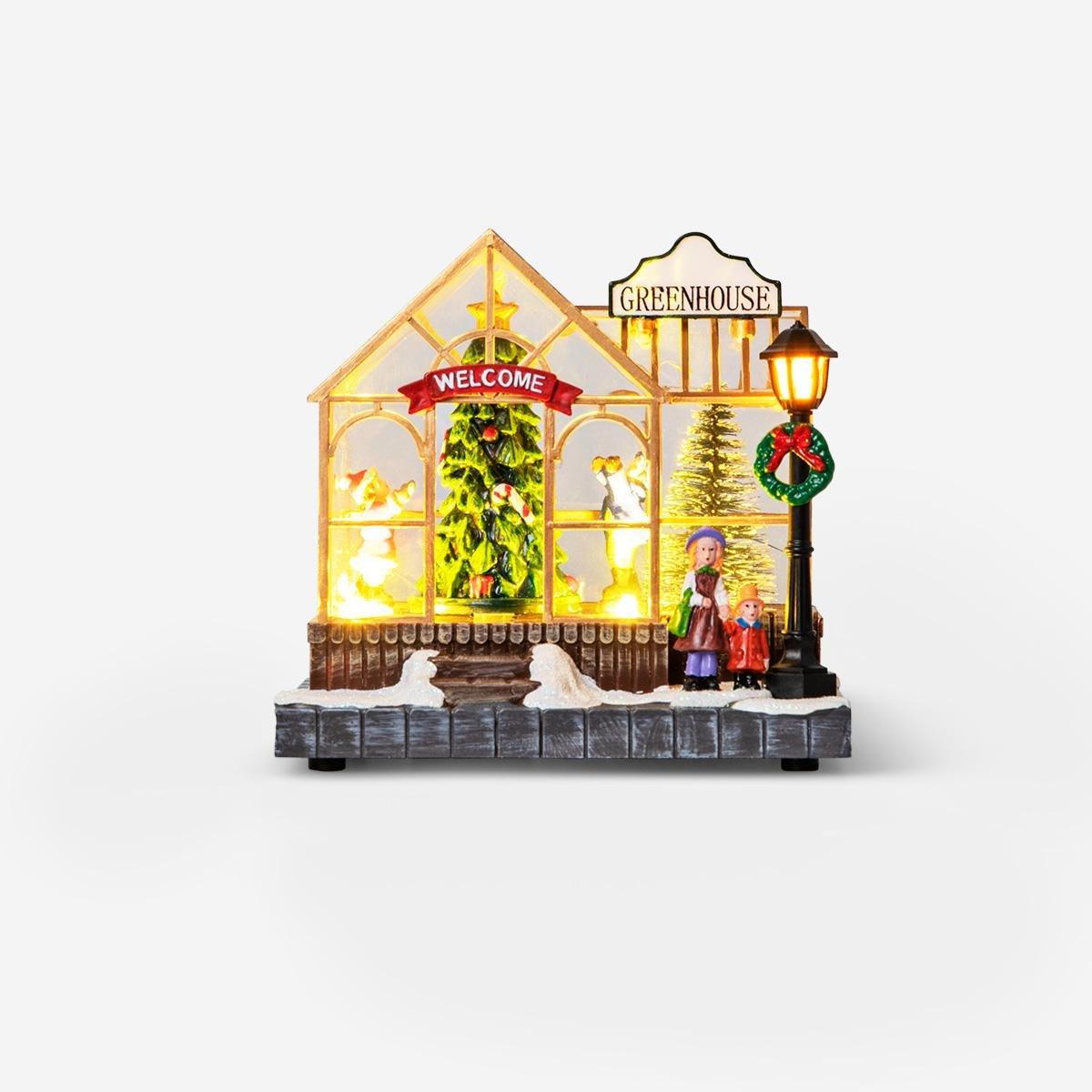 Multicolour christmas village with light and music