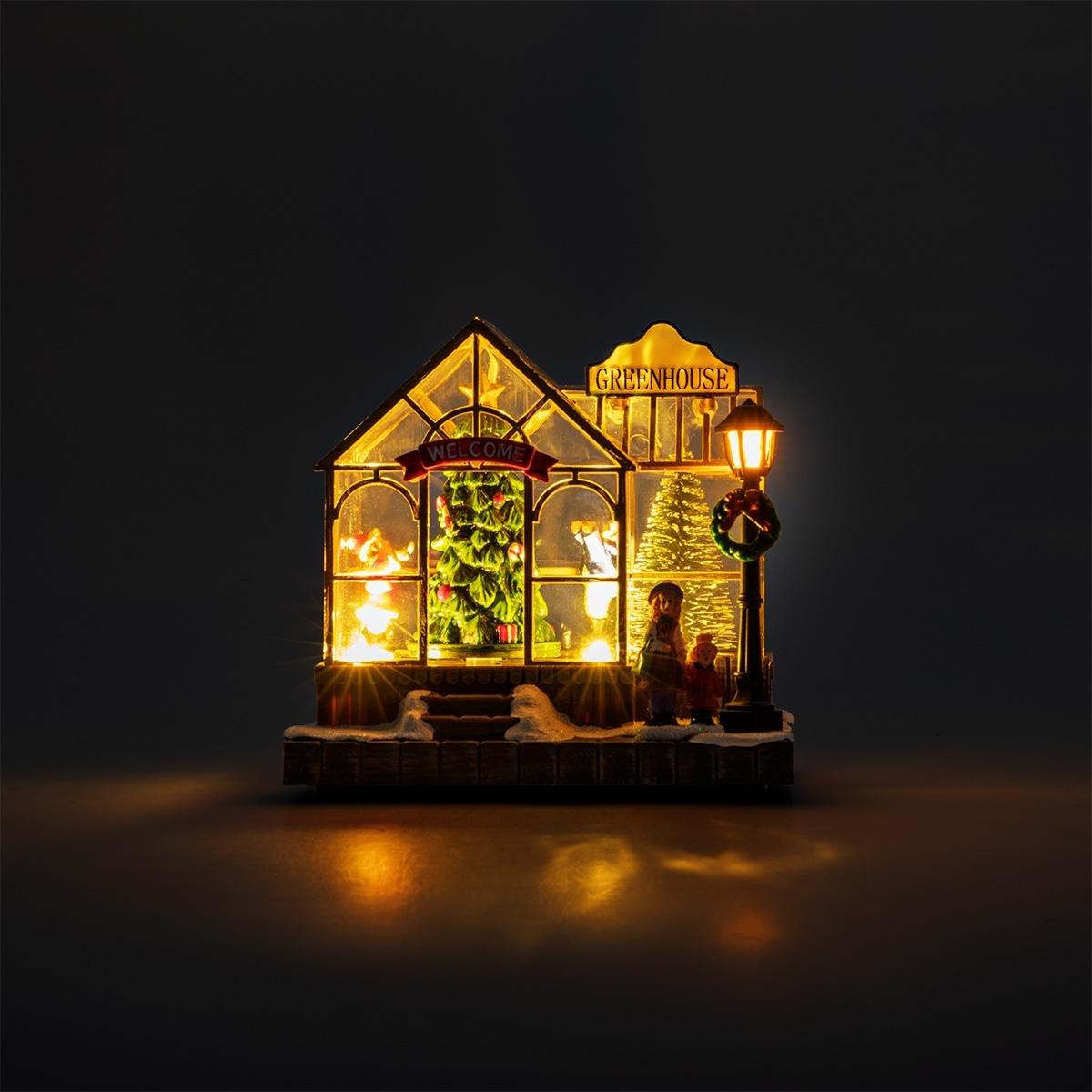 Multicolour christmas village with light and music