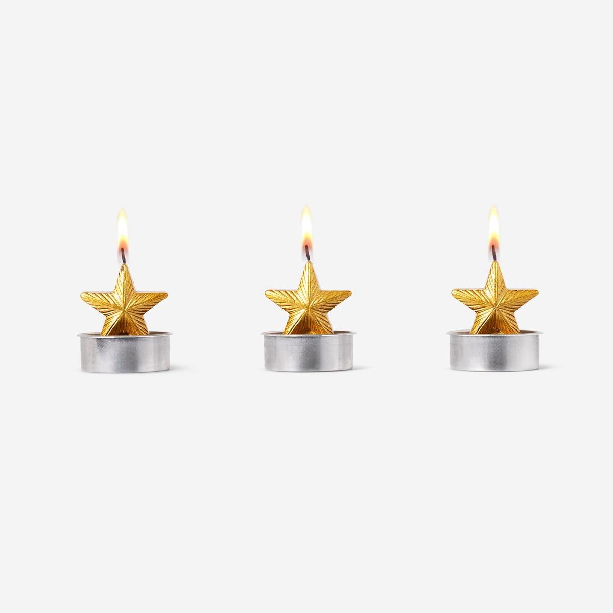Gold star shaped tealights. 3 pcs