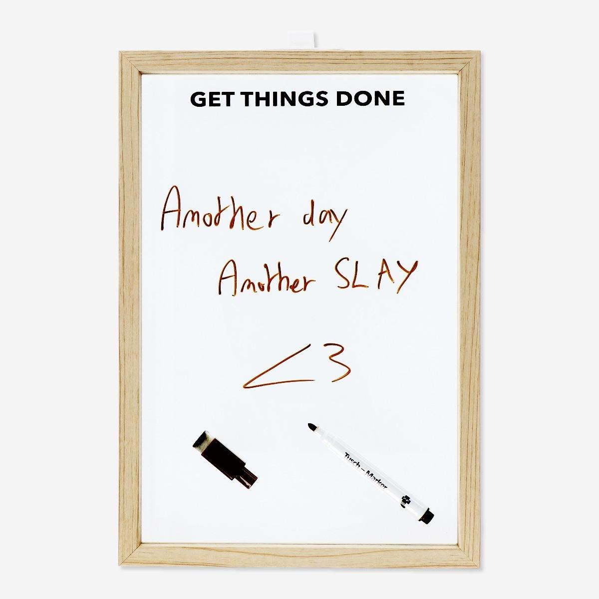 Brown wooden planner board. with marker