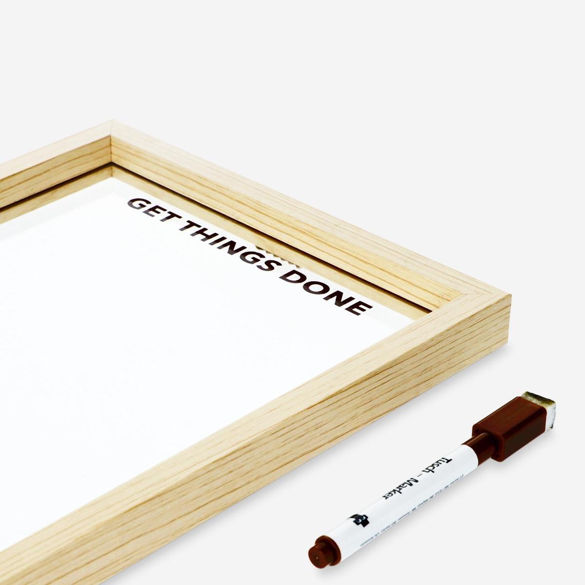 Brown wooden planner board. with marker