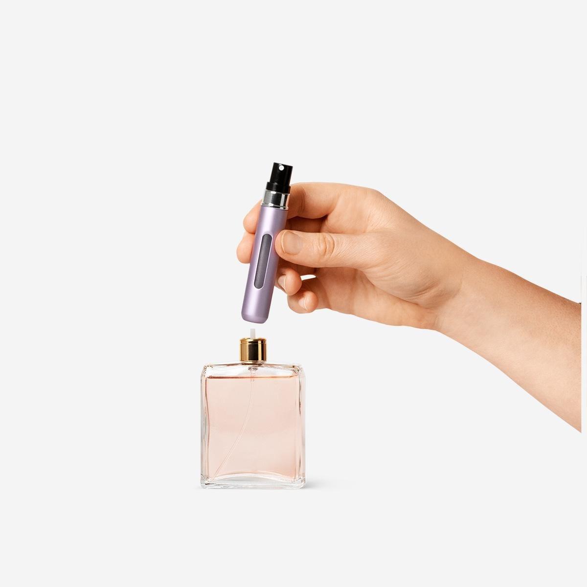 Purple refillable travel perfume bottle
