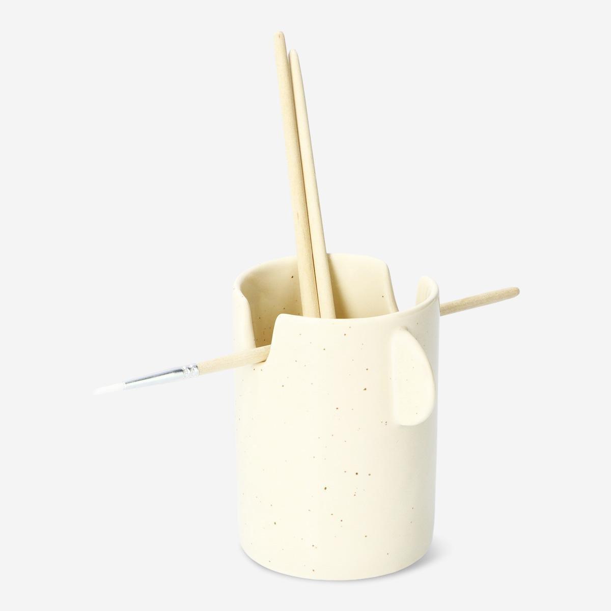 Cream paintbrush holder